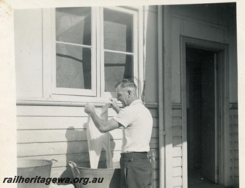 P06007
WAGR driver Ted Plews doing his washing at the Mullewa Barracks
