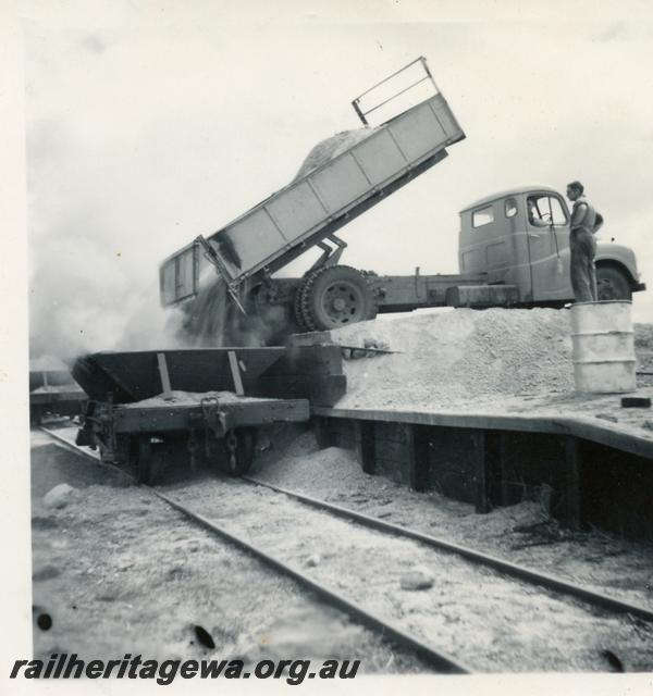 P06034
Ballast hoppers being loaded from trucks, Canna, EM line
