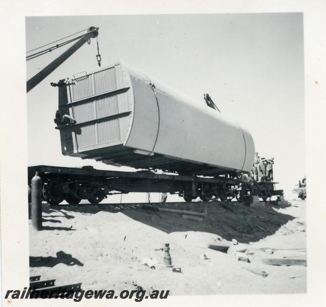 P06042
VD class van being lifted to be placed upon a flat wagon at derailment between Austin and Moyagee, NR line
