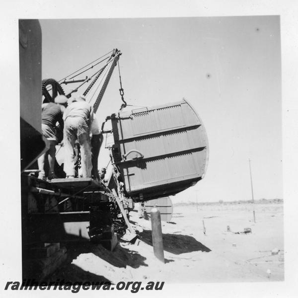 P06043
VD class van being lifted to be placed upon a flat wagon at derailment between Austin and Moyagee, NR line, end view
