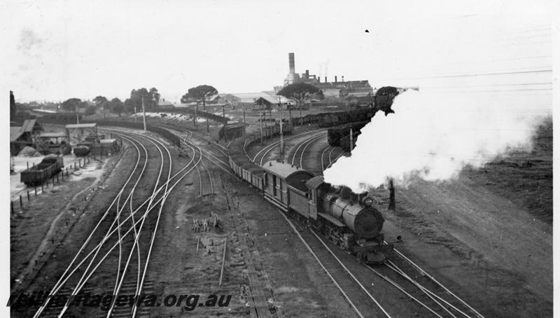 P06197
Track work, looking east from East Perth, elevated view, E class shunting a coal train.
