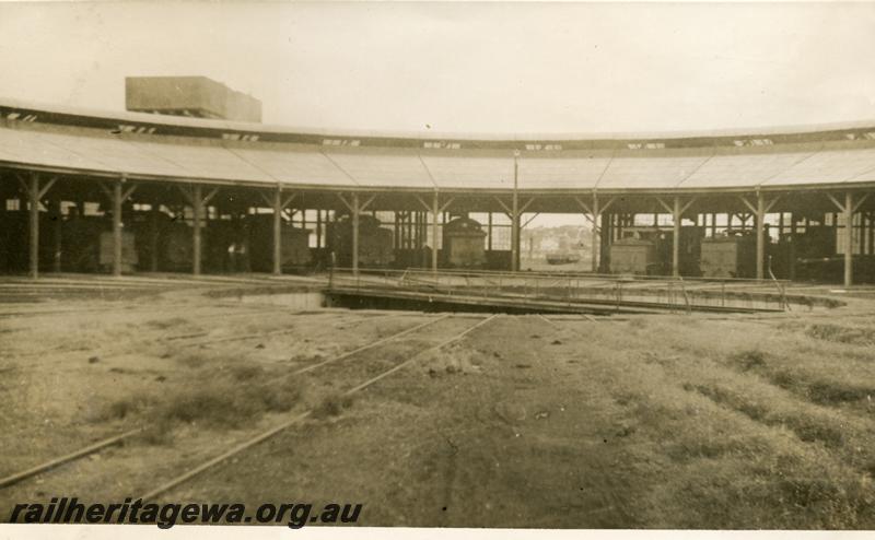 P06273
Roundhouse, Bunbury loco depot, view across turntable showing road through the roundhouse.
