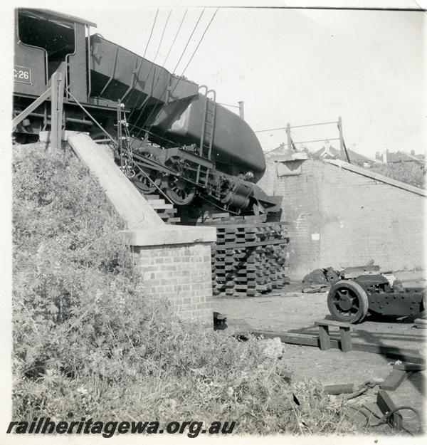 P06311
ASG class 26 Garratt, derailed and hanging over the Davies Street subway, Claremont, view looking away from loco.

