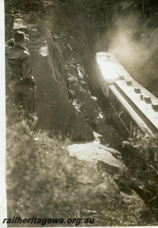 P06341
ADE class, about to enter tunnel, ER line, front and side view, towing an AG class Gilbert car as a trailer, view looking down on track. Same as P6209.
