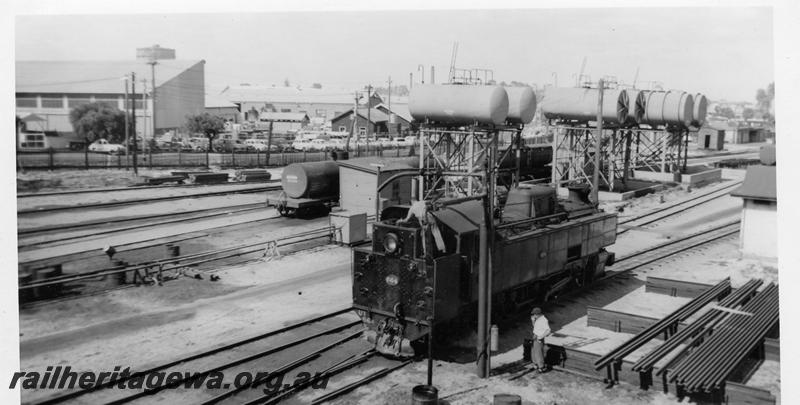 P06529
UT class 664, re-fuelling depot with elevated tanks ex JG tank wagons, East Perth loco depot, view from footbridge, loco being re-fuelled
