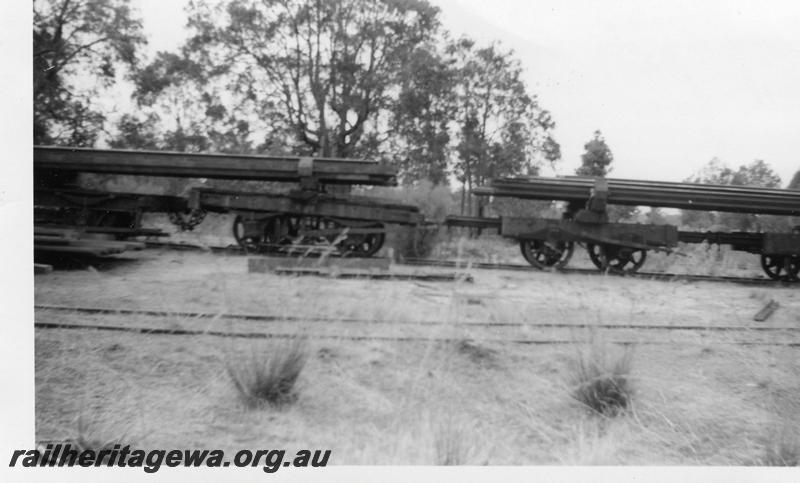 P06533
Timber jinkers loaded with rails, near Mundijong
