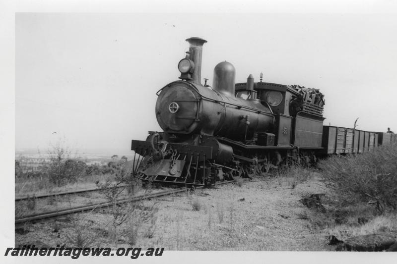 P06581
Millars loco No.58, halfway between Jarrahdale Mill and Mundijong. Jarrahdale line, front and side view, on short goods train, same as P6574
