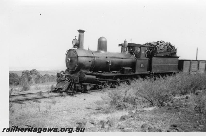 P06582
Millars loco No.58, halfway between Jarrahdale Mill and Mundijong. Jarrahdale line, front and side view, on short goods train, similar to P6574
