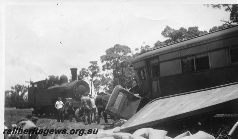 P06712
ASA class 445, N class loco, Armadale, SWR line, shows aftermath of a collision with a semi trailer truck, painted in the green and cream livery.
