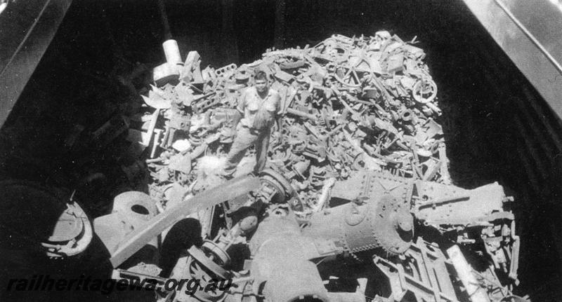 P06770
Scrap metal from the Port Hedland to Marble Bar railway, PM line, in ship's hold

