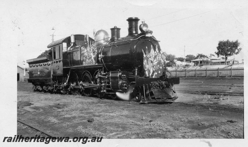 P06801
E class 352, East Perth Loco Depot, decorated for the visit of the Duke of York. This loco hauled the Royal Train from Perth to Pinjarra and return, side and front view
