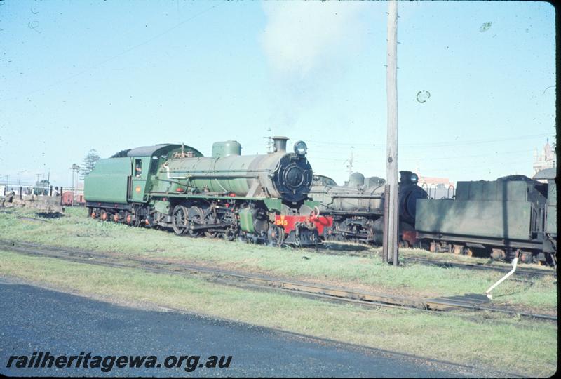 P06810
W class 945, Bunbury, side and front view, PMR class locos in background stowed
