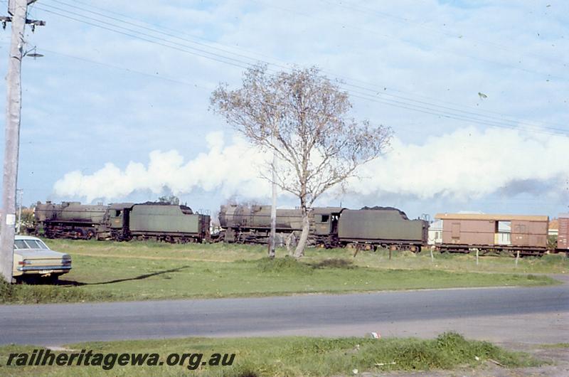 P06882
V class double heading, Strickland Street level crossing, Bunbury, goods train
