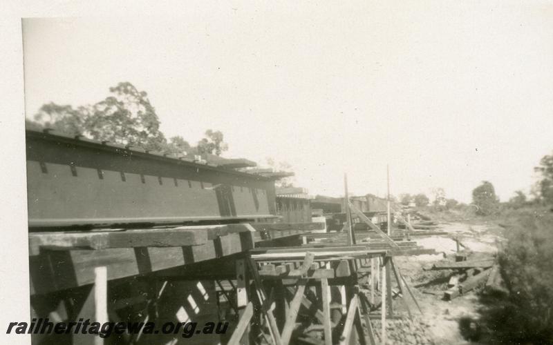 P06910
6 of 6 views of the replacement of the timber trestle bridge over the Serpentine River, just north of Serpentine Station with a steel girder bridge, SWR line.
