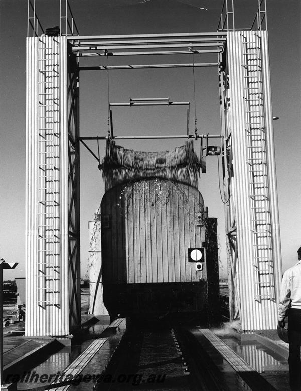 P06938
Carriage washing plant, Forrestfield Yard, end view of carriage being washed
