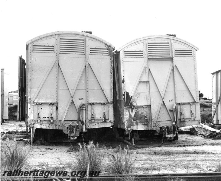 P07006
DC class vans, end view showing damage due to derailment
