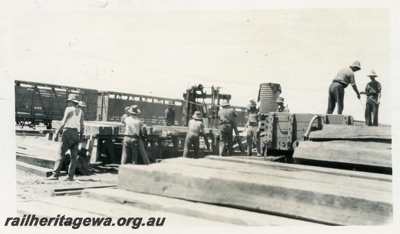 P07013
2 of 7 photos of the construction of the Cue - Big Bell railway, NR line, shows the adzing and boring gang
