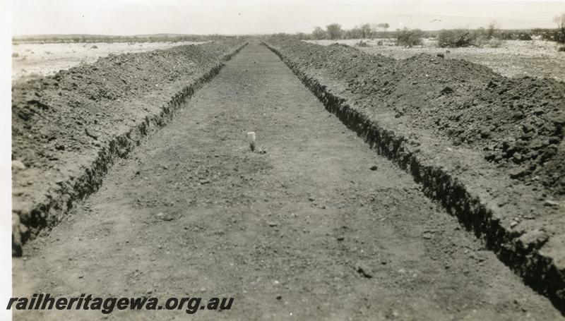 P07014
3 of 7 photos of the construction of the Cue - Big Bell railway, NR line, view shows the earthworks for the sunken road
