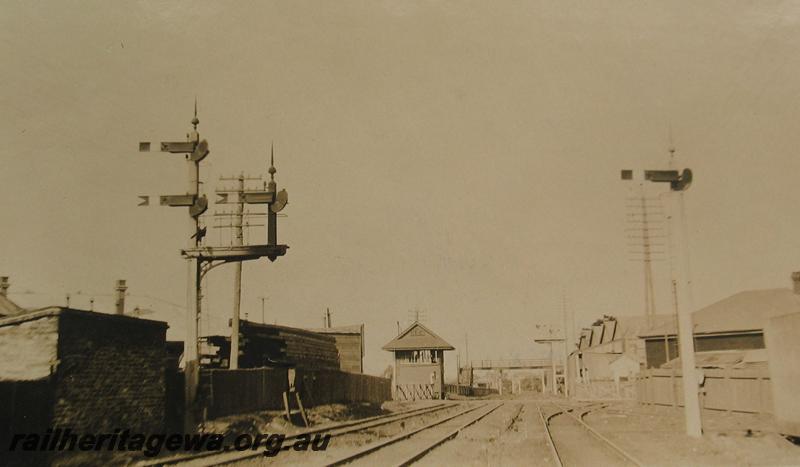 P07208
Signal box, signals, signal, Mackie Street crossing (later renamed Moore Street), East Perth, looking east.
