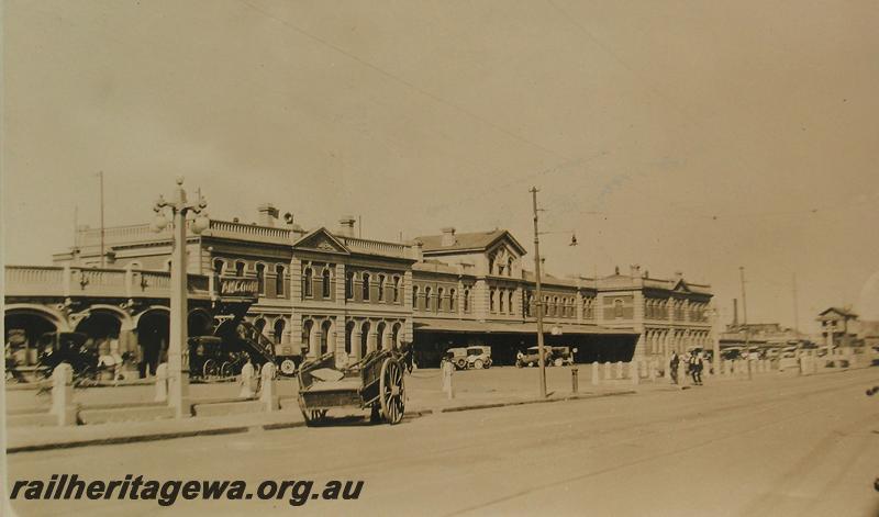 P07215
Perth Station, street side looking east, horse & cart in foreground
