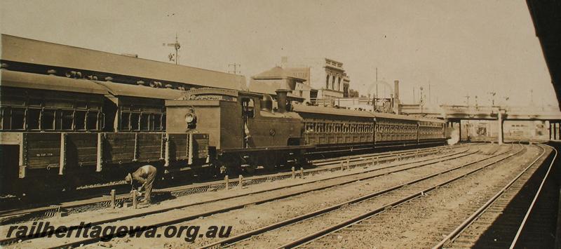 P07238
N class loco coupled to a R class wagon, Perth Station looking east
