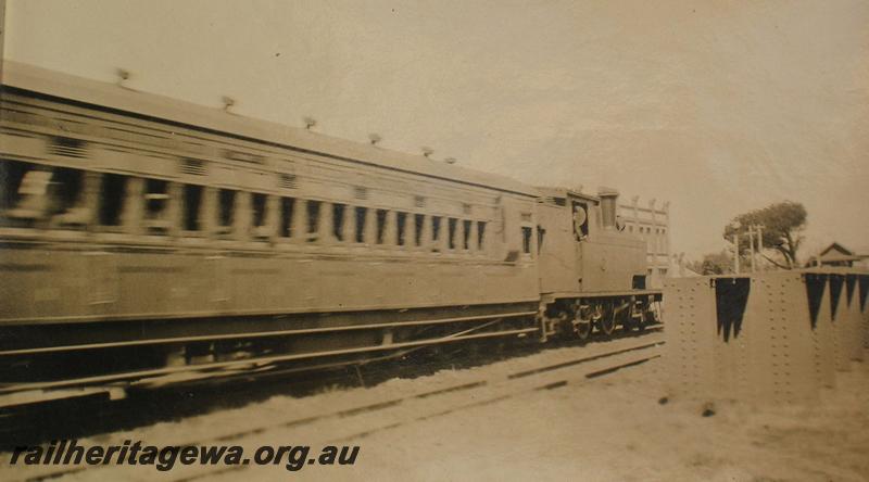 P07251
N class loco, suburban carriage with brake compartment crossing a subway with steel girders, signal box in the backgroound, Mount Lawlwy, ER line 
