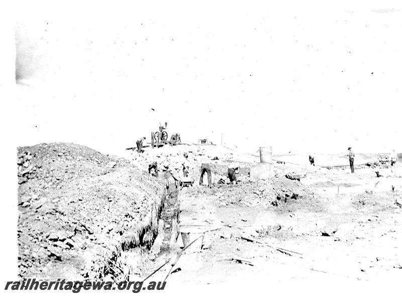 P07293
8 of 19 photos of the construction of the railway dam at Wurarga. NR line, pug core wall
