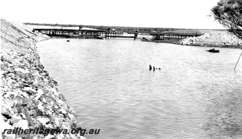 P07300
15 of 19 photos of the construction of the railway dam at Wurarga. NR line, shows reservoir flooded after sudden thunderstorm
