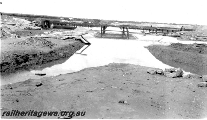 P07301
16 of 19 photos of the construction of the railway dam at Wurarga. NR line, view from west after flooding
