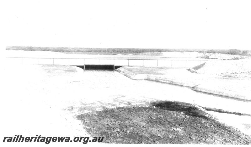 P07303
18 of 19 photos of the construction of the railway dam at Wurarga. NR line, dam complete and full
