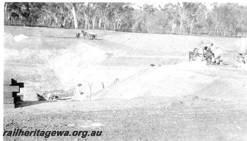 P07320
16 of 32 photos of the construction of the railway dam at Hillman, BN line, concreting inlet race
