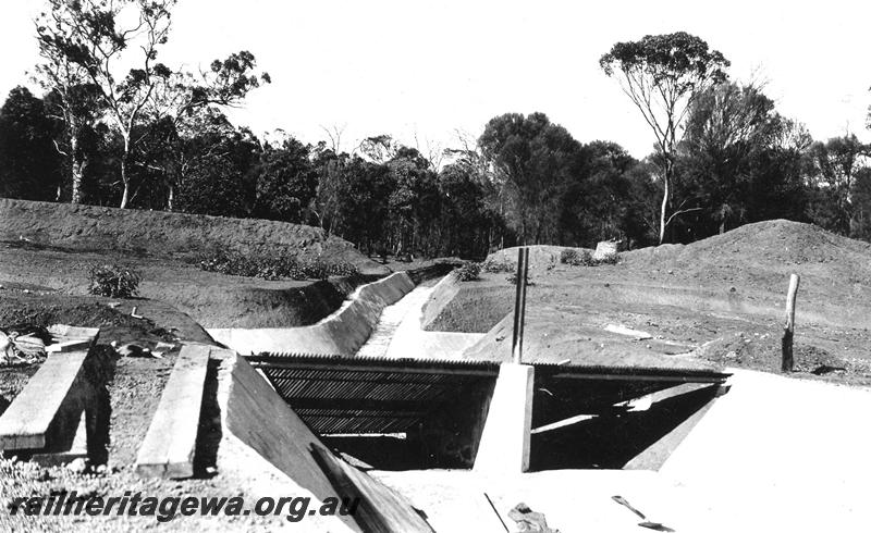 P07349
13 of 15 views of the construction of the railway dam at Williams, BN line, debris arrester on feeder drains
