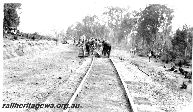 P07358
7 of 10 views of the construction of the deviation at Allanson, BN line, gangers pulling track to new alignment, Yokain - Allanson
