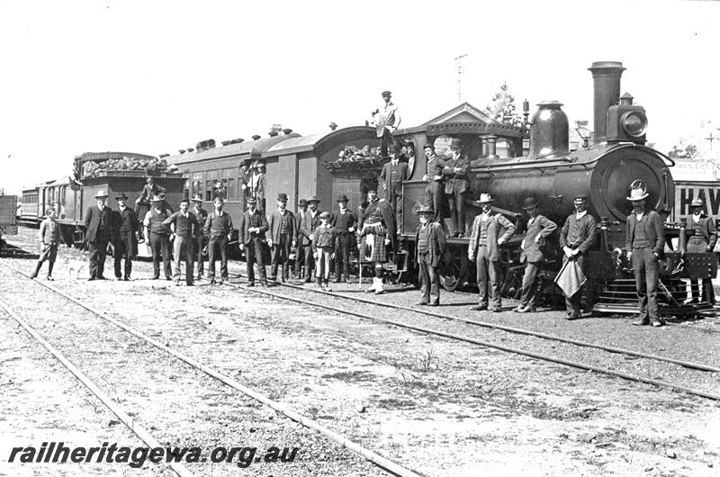 P07379
T class loco on special train, Katanning, GSR line, passengers including a kilted gentleman posing in front of train, same as P2034 c1908
