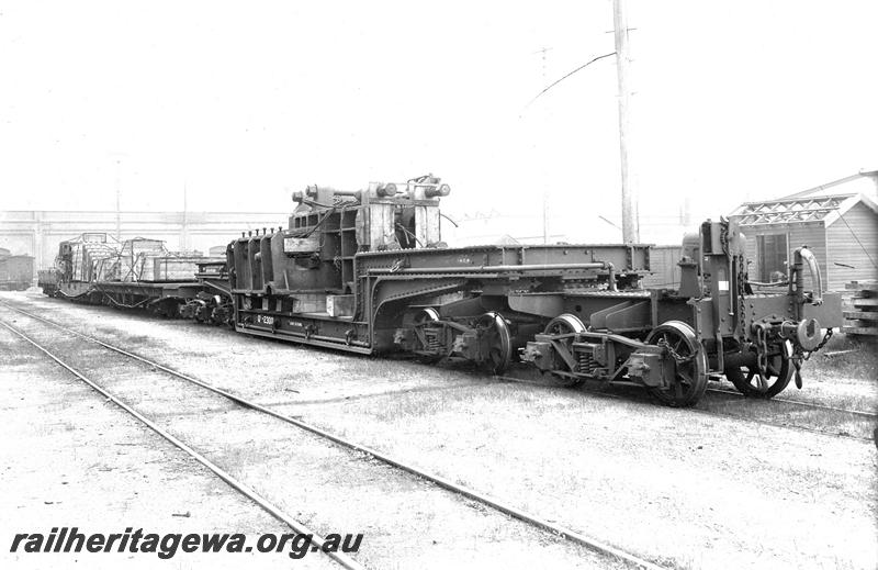 P07395
7 of 9 photos depicting wartime activities at the Midland Workshops, QX class 2300 trolley wagon arriving at the Midland Workshops with the Baldwin 