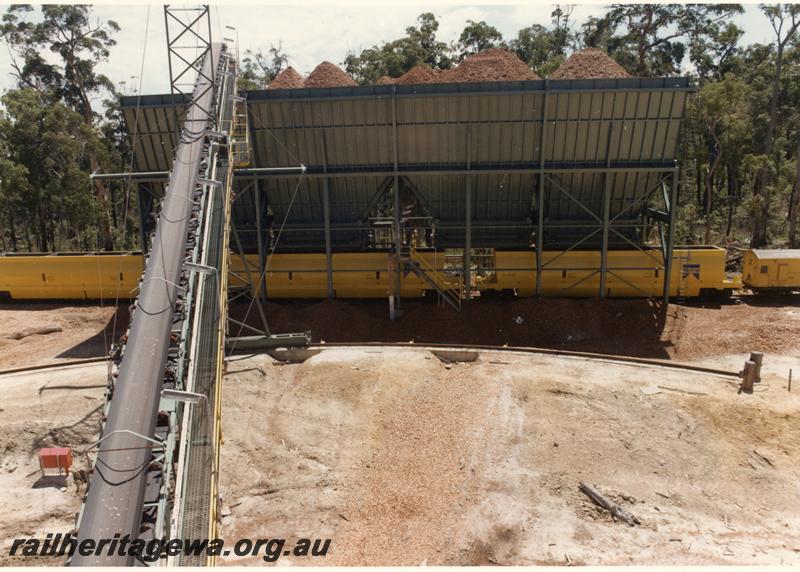 P07505
XO class woodchip hoppers, loading bins, Lambert, being loaded, end and side view, under construction
