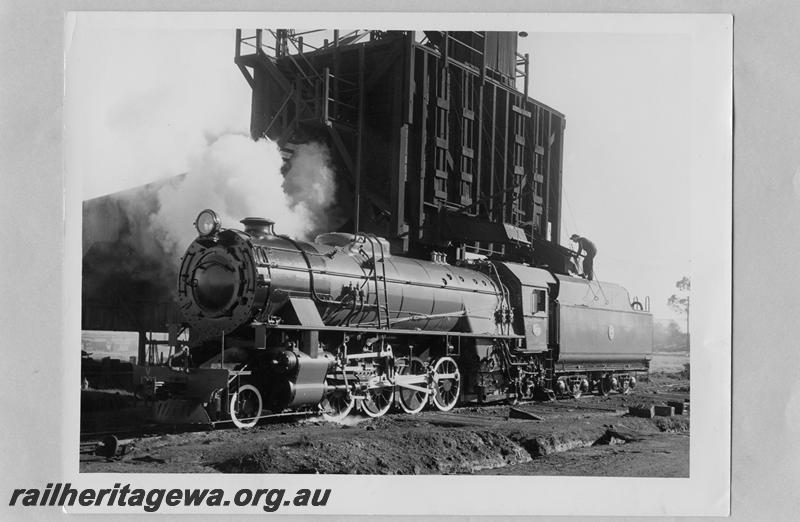 P07583
V class 1203, with white wall tyres, as new condition, side and front view, East Perth Loco Depot with coal stage behind loco.
