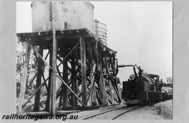 P07589
M class Garratt, water towers, Bergining, PN line, taking water.
