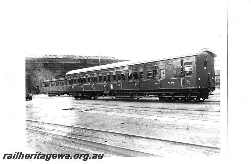 P07647
AU class 218 first class carriage with Guards compartment, Midland Workshops, the first carriage to painted in the new trial all over larch green livery with the handrails and lettering in gold enamel and fitted with the WAGR round crest, (ref: 