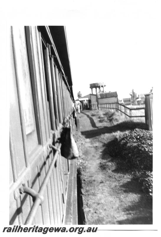 P07665
Station buildings, water tower, Harvey, SWR line, photo taken from window of a Perth bound passenger train.
