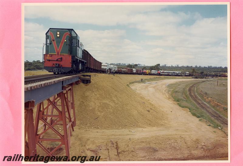 P07697
A class 1511, steel girder bridge, Meenaar flyover, stationary goods train, coloured version of P0949
