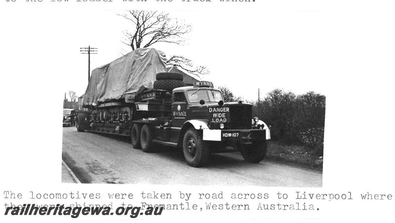 P07739
Y class locomotive, departing Clayton Equipment Co. works, Hatton, UK, being transported to the docks at Liverpool, on semi trailer.
