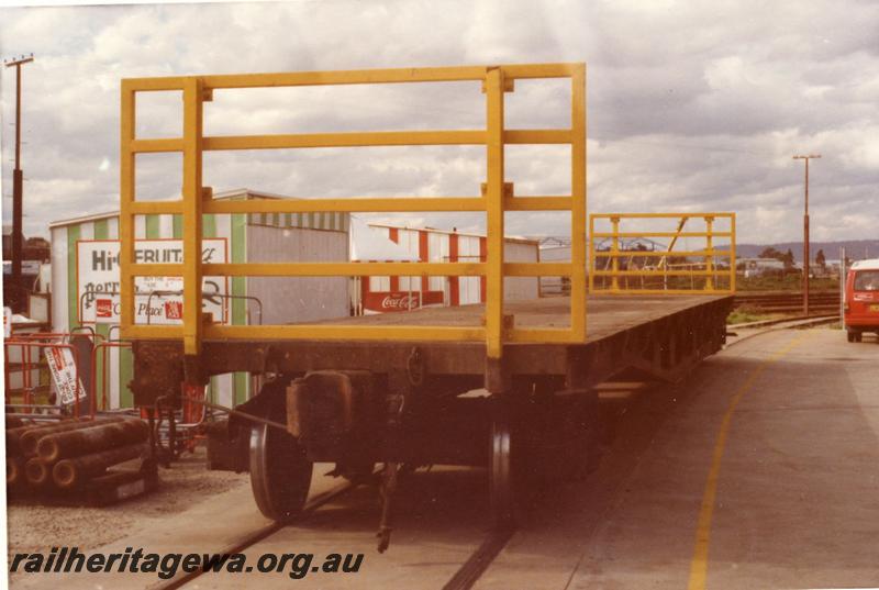 P07909
WQCX class Standard Gauge, flat wagon with open bulkheads, end view.
