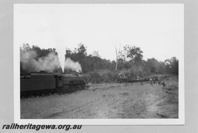 P08083
V class 1215 crossing a PM class or PMR class on goods train, photographers present
