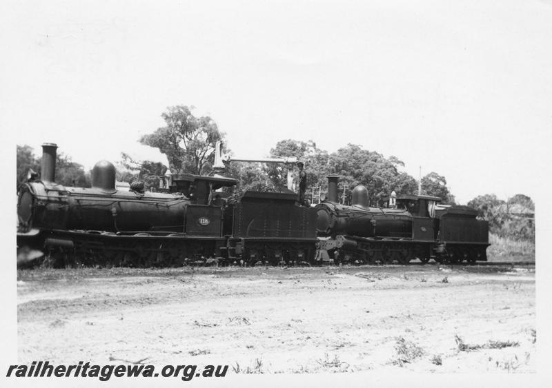 P08125
2 of 3 views of G class 118 hauling G class 67 from Bunbury to Midland, Yarloop, SWR line, taking water, front and side view
