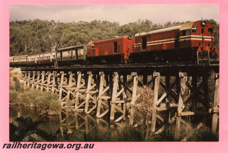 P08130
F class 43, F class 45 in plain red livery, trestle bridge, Tullis, PN line, ARHS tour train.
