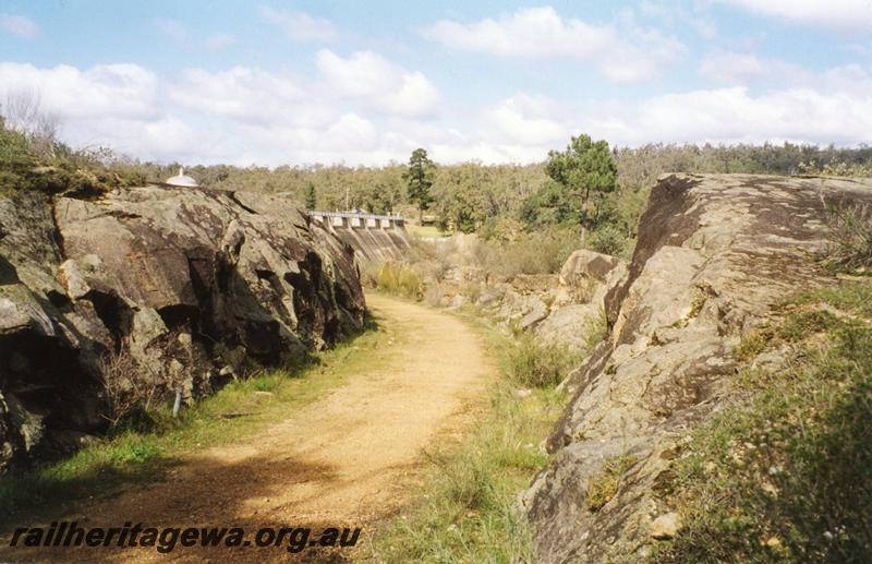 P08349
Railway cutting, abandoned line at Mundaring Weir, MW line, view of weir in the background.
