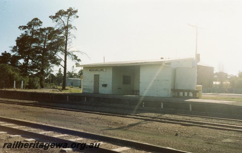 P08643
Woodanilling, station building, platform, nameboard, view from rail side, GSR line.
