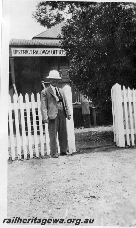 P08694
E. W. Vaughan, District Traffic Superintendent at Narrogin, standing outside the 