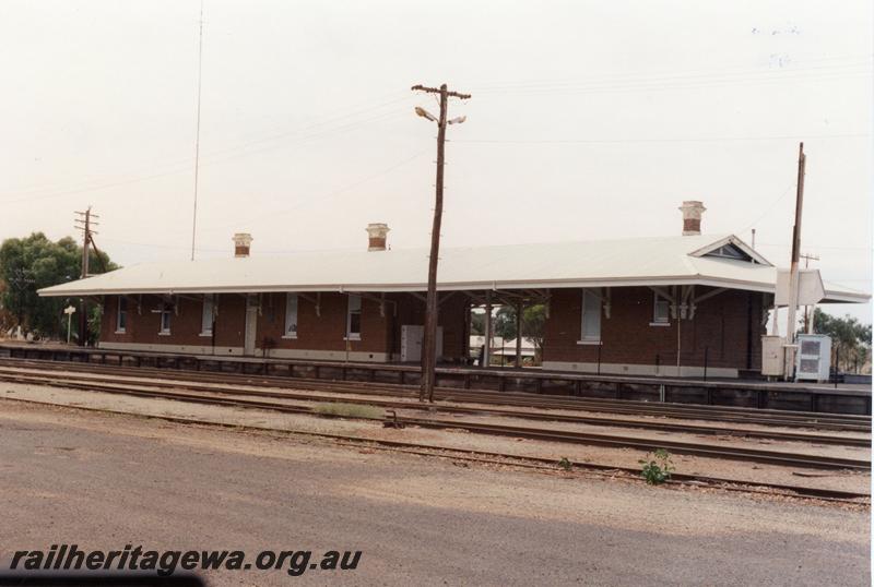 P08800
Station building Wagin, GSR line, side view across yard.
